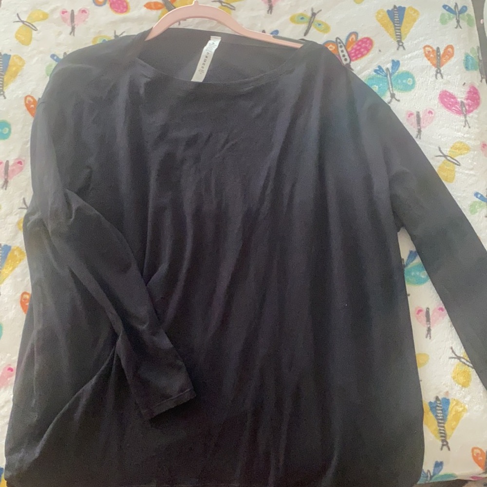 Lululemon athletics black top. Size 12. Never worn